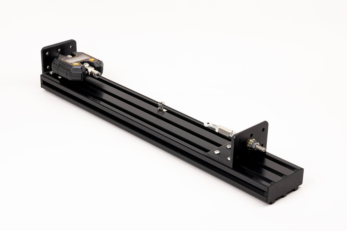 PRO / Black | STCJ PRO spoke tension calibration jig, black anodized 3090 extrusion, three-quarter view